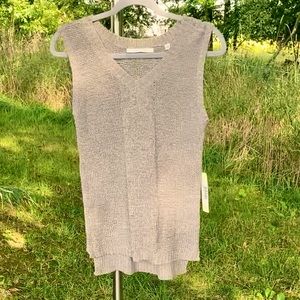 Cyrus: Women’s XS V-neck sweater tank in moon rock   (a medium taupe color).
